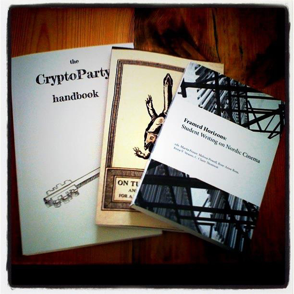 Some books made with Booktype L-R The Cryptoparty Handbook, On Turtles and Dragons and Framed Horizons: Student writing on Nordic cinema | Photo credit Kristin Trethewey