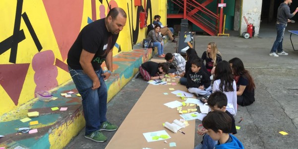 Hacks/Hackers speaker, JSK Stanford Fellow and friend of Sourcefabric Nuno Vargas leads a design thinking workshop for kids at the Media Party in Buenos Aires. Kids came up with products to solve problems in their lives. | Photo by Douglas Arellanes